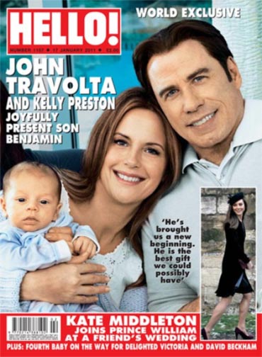 John Travolta and Kelly Preston pose with Benjamin