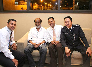 Rajnikanth poses with his fans