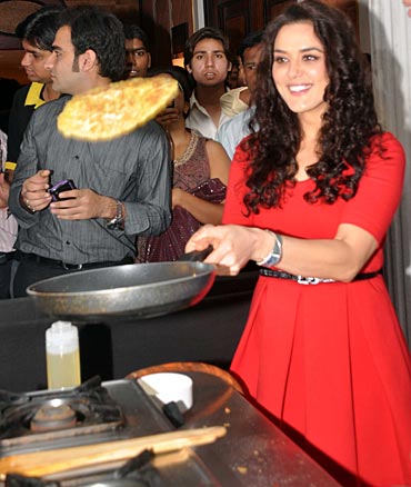 Preity Zinta flips an omelette