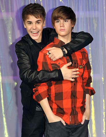 Justin Beiber with the waxwork model