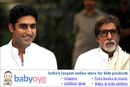 Amitabh and Abhishek Bachchan pose for the media