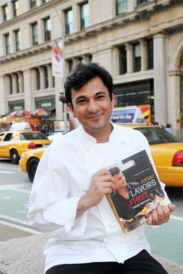 Vikas Khanna with his new book