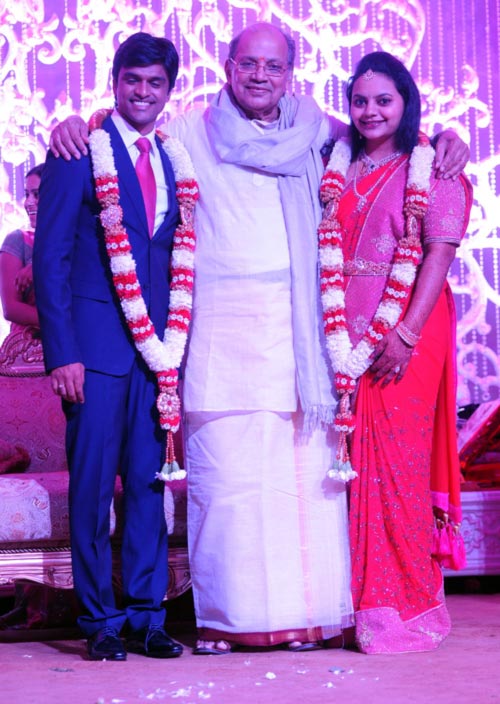 P J Sharma with the bridal couple