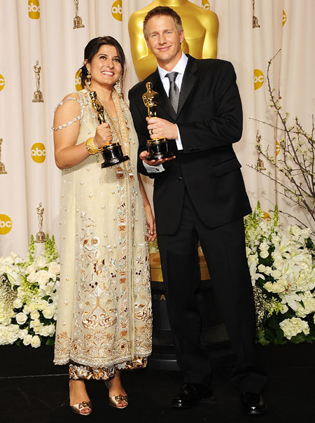 Sharmeen Obaid-Chinoy and Daniel Junge with their Oscars