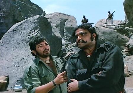 Amjad Khan and Viju Khote in Sholay.