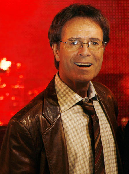 Cliff Richard poses for photographers at a music store in London 2009.