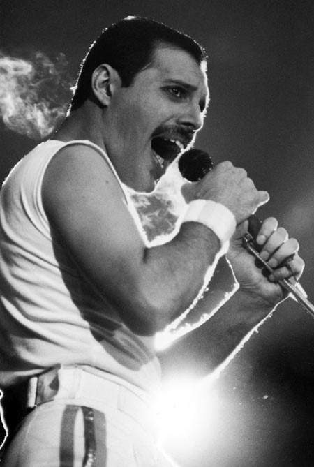 Freddie Mercury singing during a Queen concert in Stockholm in 1986.