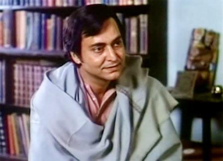 Soumitra Chatterjee as Feluda in Sonar Kella