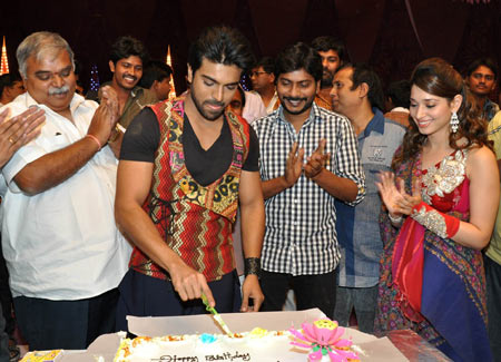 Ram Charan cuts his birthday cake