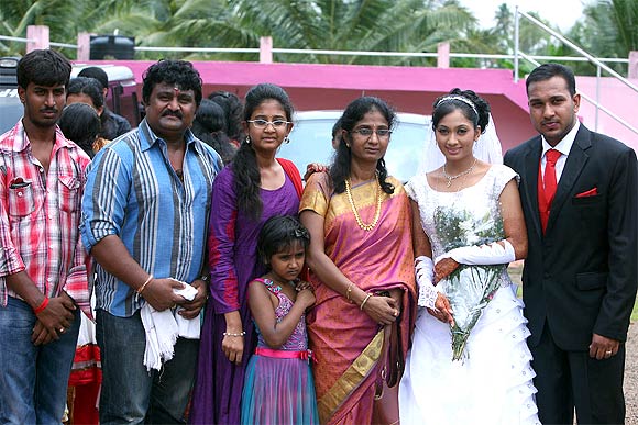 Udayathara and Jubin Joseph pose with the family