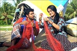 A scene from Puthiya Theerangal