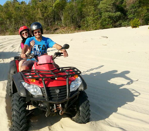 Vivian and Vahbbiz Dsena on the ATV bike