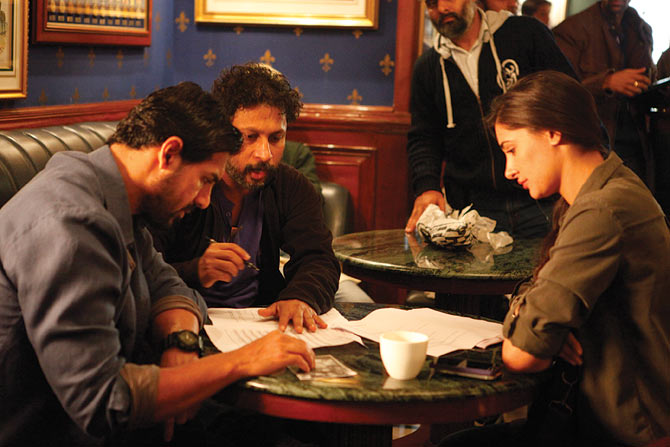 John Abraham, Shoojit Sircar and Nargis on the sets of Madras Cafe