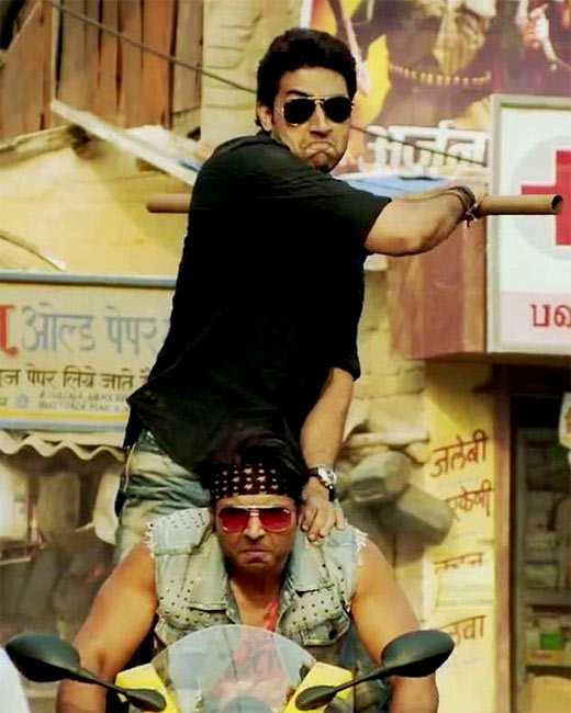 Abhishek Bachchan and Uday Chopra in Dhoom 3