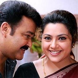 Mohanlal and Meena in Drishyam