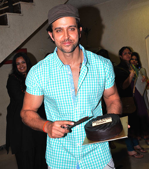 Hrithik Roshan with his birthday cake at his residence