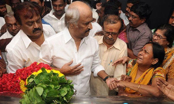 Rajinikanth (centre) with Vijayakanth to his right