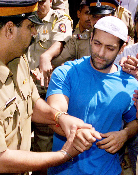 Salman Khan being escorted to a Mumbai court in 2002