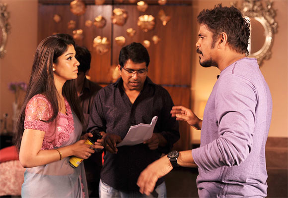 Director Dasaradh with Akkineni Nagarjuna and Nayanthara