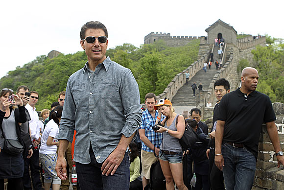 Tom Cruise stands on the Great Wall in Beijing