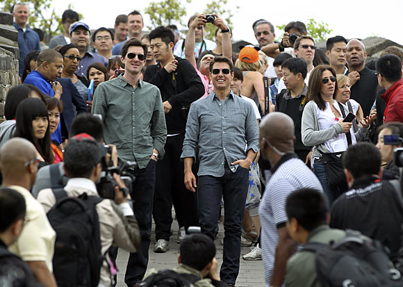 Tom Cruise and director Joseph Kosinski on the Great Wall in Beijing