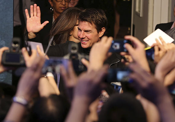 Tom Cruise waves to his fans
