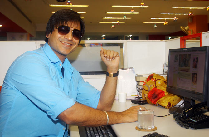 Vivek Oberoi takes a break from the Rediff Chat to smile at the camera