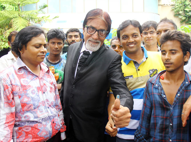 A fan dresses up as Amitabh Bachchan