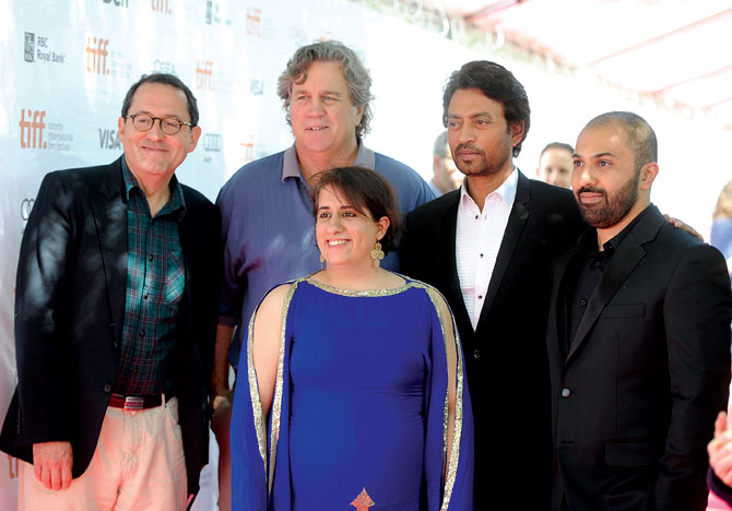 Co-Presidents of Sony Pictures Classics Michael Barker and Tom Bernard with Gneet Monga, Irrfan Khan and Ritesh Batra arrive at the The Lunchbox Premiere during the 2013 Toronto International Film Festival at Roy Thomson Hall