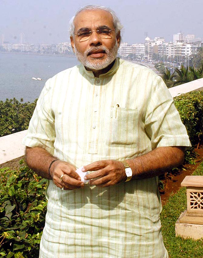 Narendra Modi in Mumbai. Behind him is the famed Marine Drive.