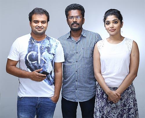 Kunchacko Boban and Rima Kallingal with director Santhosh Viswanath