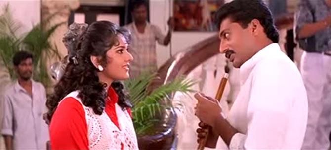 Meenaxi Sheshadri and Prakash Raj in Deut