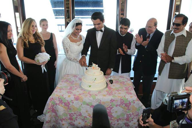 Veena Malik and Asad Khan Khattak, surrounded by bridesmaids and other guests