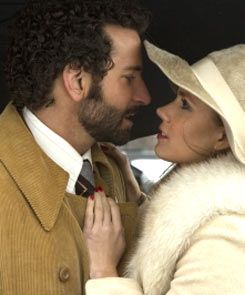 Bradley Cooper and Jeniffer Lawernce in American Hustle
