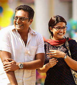 Prakash Raj and Sneha in Un Samayal Arayil 