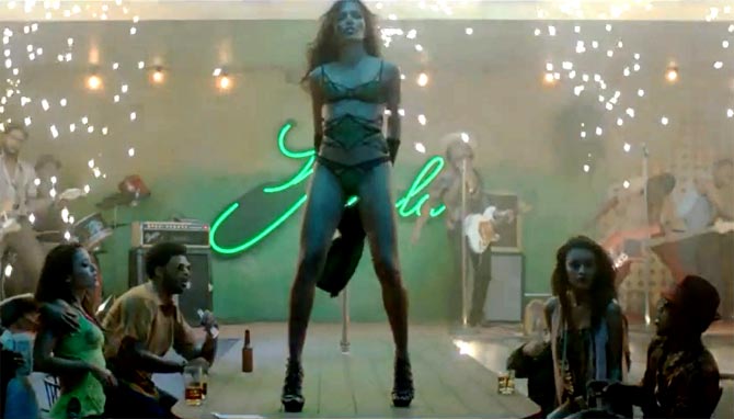 Freida Pinto in Bruno Mars's Gorilla music video.