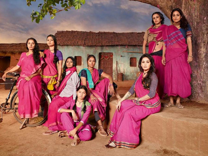 Madhuri Dixit in Gulaab Gang (seated, right)