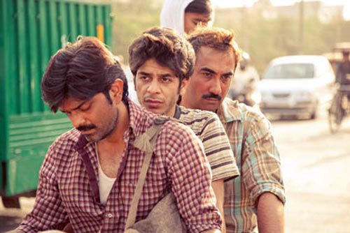 Shashank Arora, center, and Ranvir Sheorey, right, in a scene from Titli.