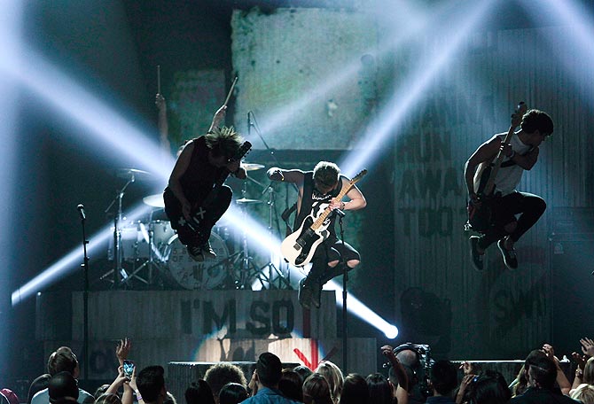 5 Seconds of Summer performs on stage