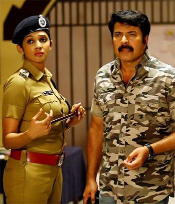 Nyla Usha and Mammootty in Fireman