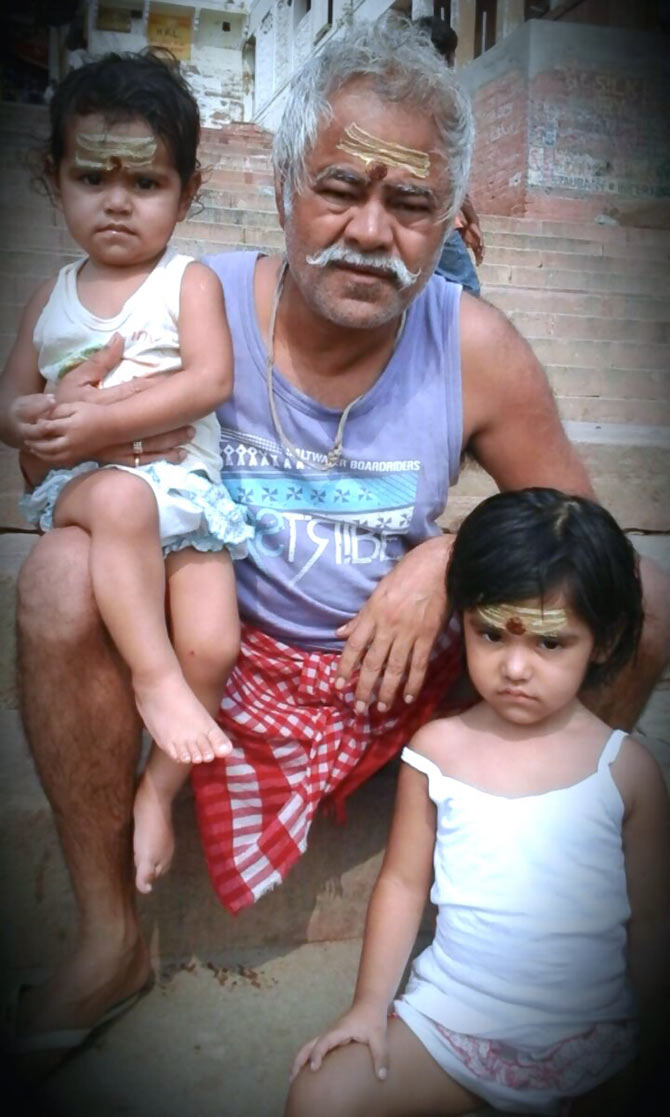 Sanjay Mishra with his daughters