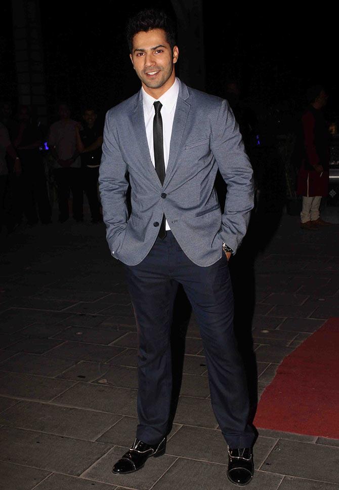 PIX: Bachchans, Varun, Sonakshi mingle at a wedding reception - Rediff ...