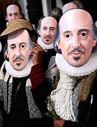 People wearing Shakespeare masks