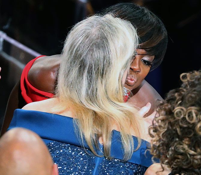 Viola Davis and Meryl Streep hug at the Oscars