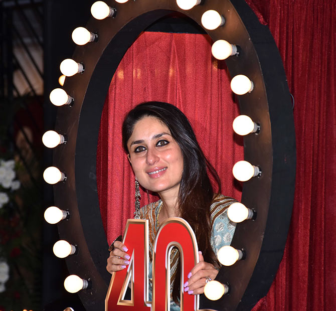 Kareena Kapoor poses with the Prithvi 40 logo.