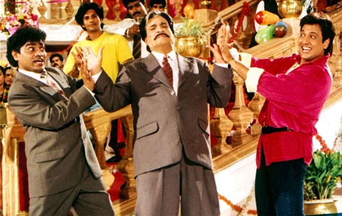 Kader Khan, centre, flanked by Govinda and Johnny Lever, left.