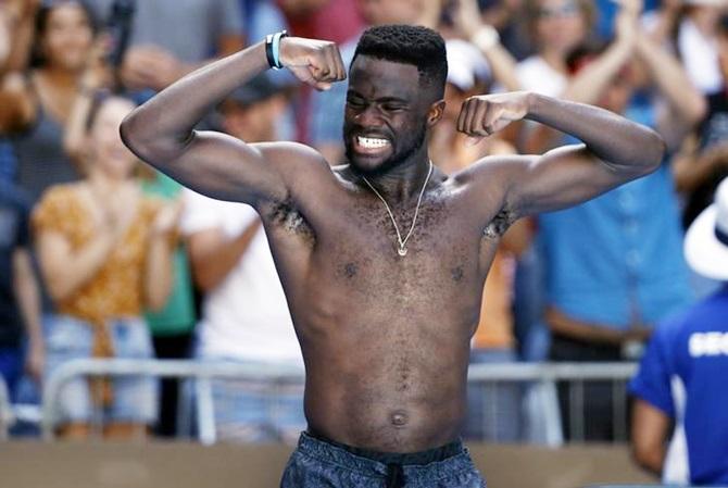 USA's Frances Tiafoe celebrates victory over Bulgaria's Grigor Dimitrov on Sunday, January 20