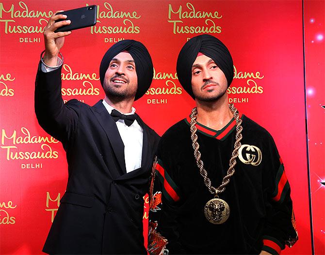 Diljit Dosanjh with his waxwork.