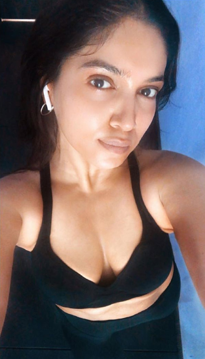 NIA SHARMA on X: Taking off a sweaty Sports-bra after workout is
