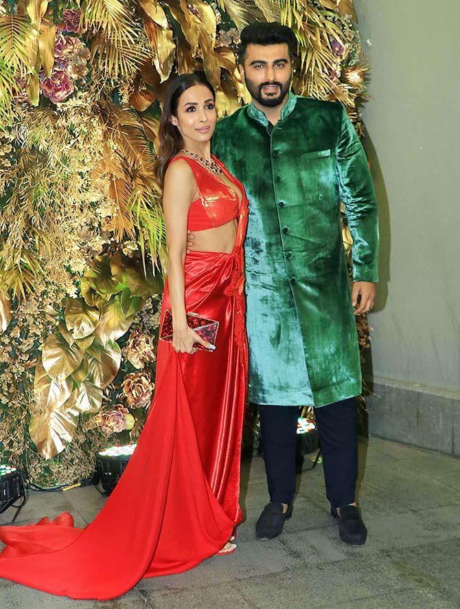 Video: Malaika-Arjun get spotted at a wedding - Rediff.com movies